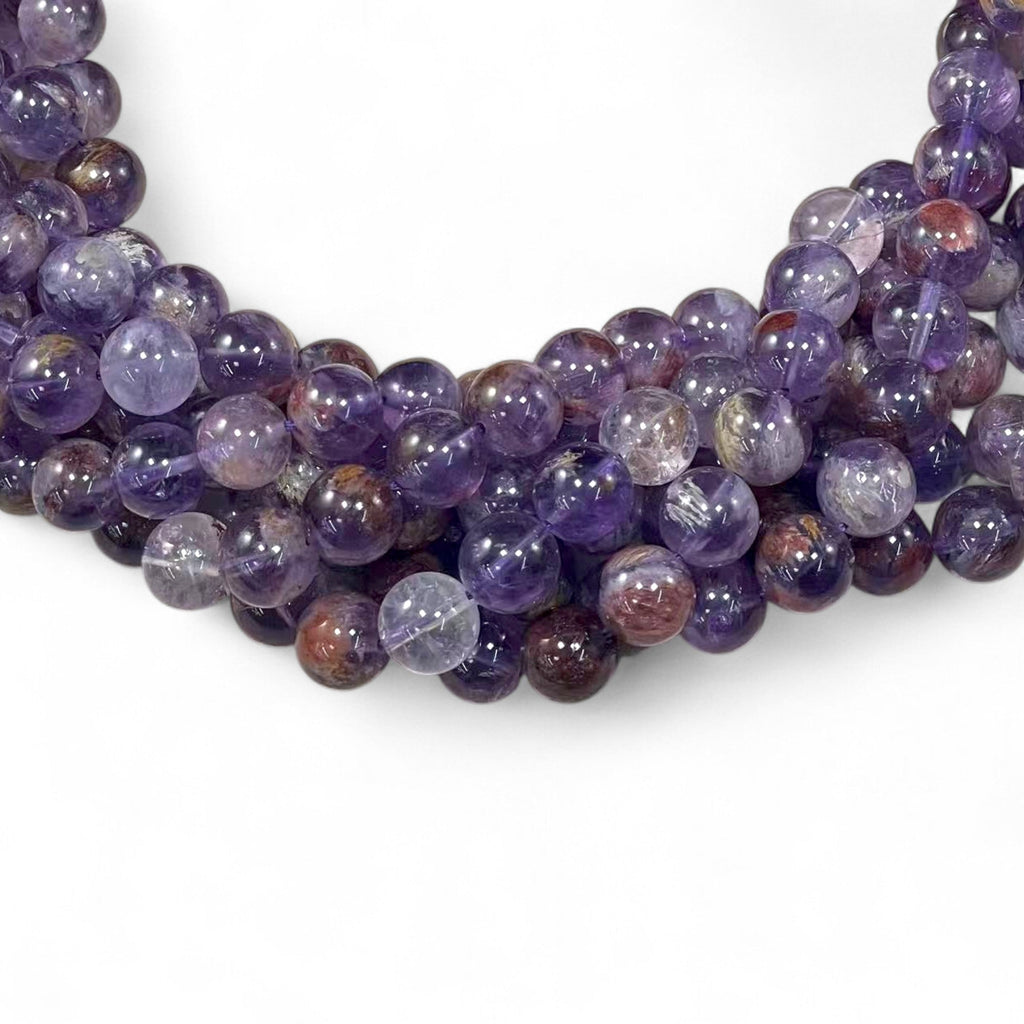 Auralite 23 aka Amethyst w/ Hematite Inclusions Round