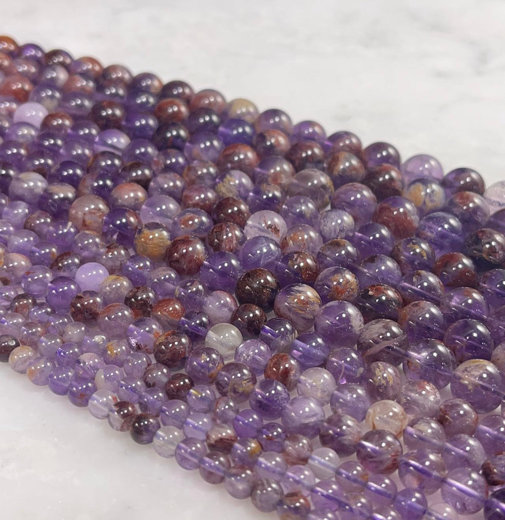Auralite 23 aka Amethyst w/ Hematite Inclusions Round